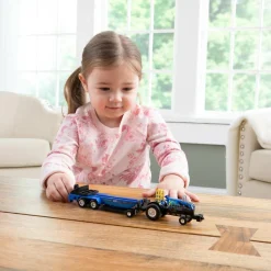 1/64 New Holland "Midnight Blue" Pulling Tractor with Pulling Sled