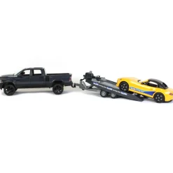 1/16 RAM 2500 Pickup with Yellow Racing Team Roadster by Bruder