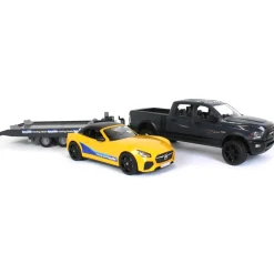 1/16 RAM 2500 Pickup with Yellow Racing Team Roadster by Bruder