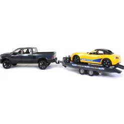 1/16 RAM 2500 Pickup with Yellow Racing Team Roadster by Bruder
