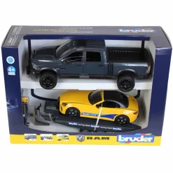 1/16 RAM 2500 Pickup with Yellow Racing Team Roadster by Bruder