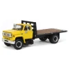 1/64 Yellow Chevy C65 Single Axle Truck with Black Flatbed, DCP by First Gear