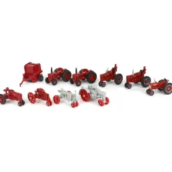 Lot of (9) 1/64 Case IH Tractors and (1) Round Baler