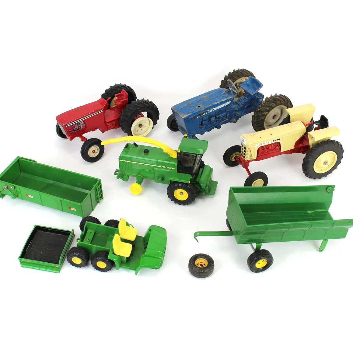 Lot of (3) 1/16 Tractors, (1) ATV, (1) John Deere Forage Harvester, (1) Dump Bed and (10 Partial Barge Wagon