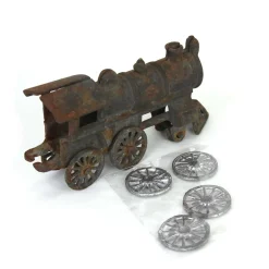 Lot of (1) Cast Iron Locomotive and (4) Wheels